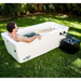 PlusLife Original Ice Bath in White Fully Assembled on grass with a men using it.png
