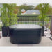 Xtreme Plunge Descent Solo Cold Plunge Tub Ultimate Package with chiller, tub and lid in Black video of model using it